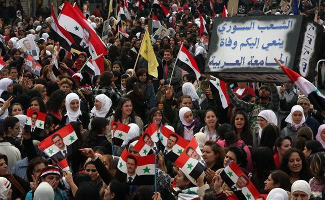 Syrian women rally in Damascus on November 24 against the Arab League